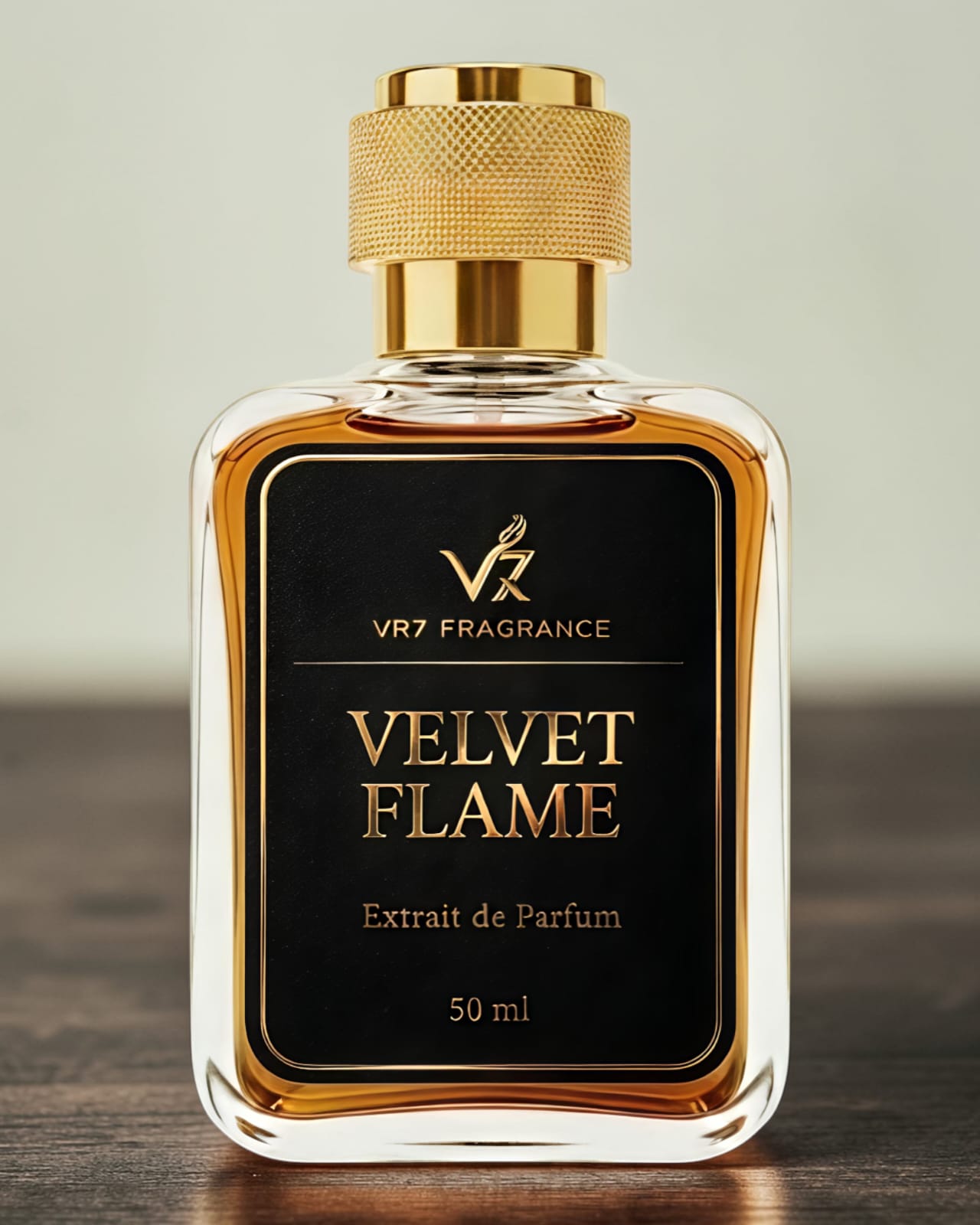 Perfume bottle labeled 'Velvet Flame' by VR7 Fragrance on a wooden surface with a neutral background